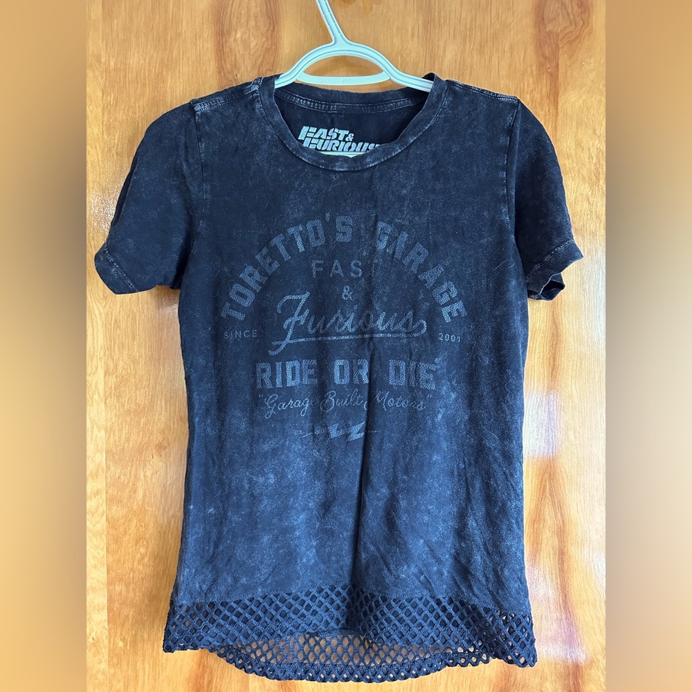 Woman’s fast and furious, and by affliction T-shirt, size small.